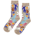 Colorful abstract-patterned socks on a beige background