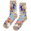 Colorful abstract-patterned socks on a beige background