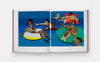 Open book showing illustrations of people on inflatable rings against a blue background