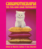 cover of the book 'Chromotherapia' with a photograph of a white kitten sitting on a stack of three silk pillows