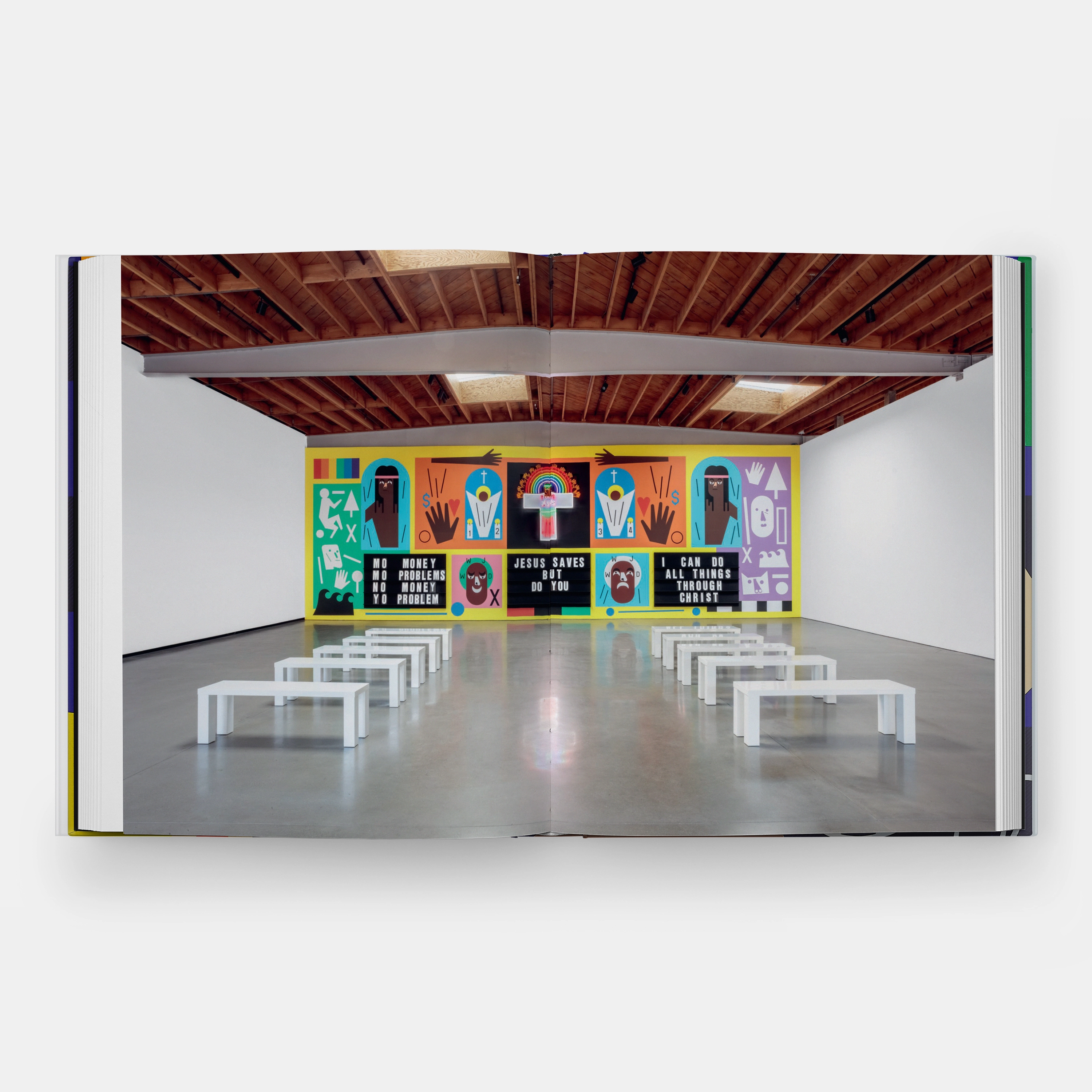 Art gallery with colorful wall art and benches on a white background